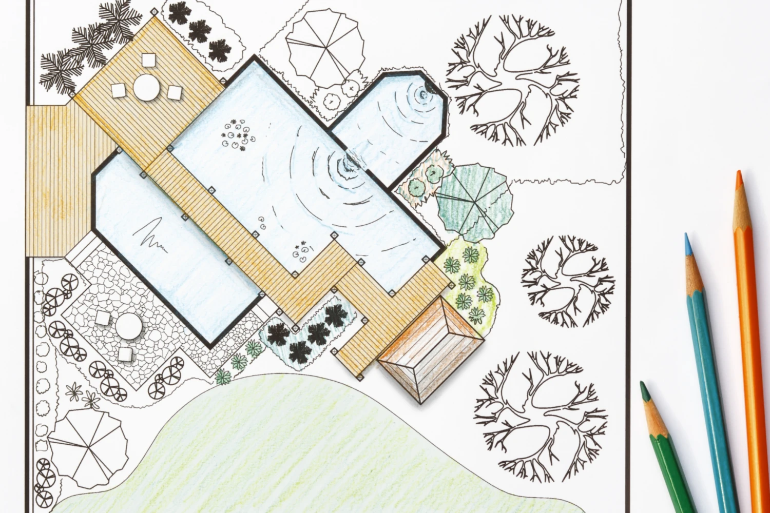 Landscape design sketch with a pool, deck, and garden layout. Features include shaded seating, circular trees, and paths. Colored pencils on the side.